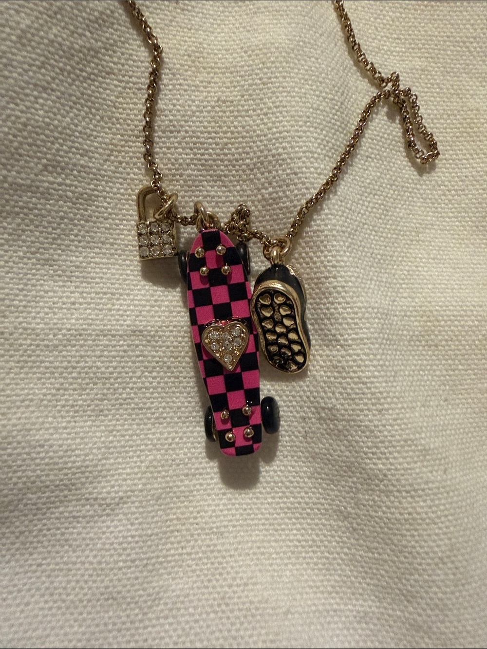 Betsey Johnson Pink and Black Checkerboard Skateboard Charm Necklace